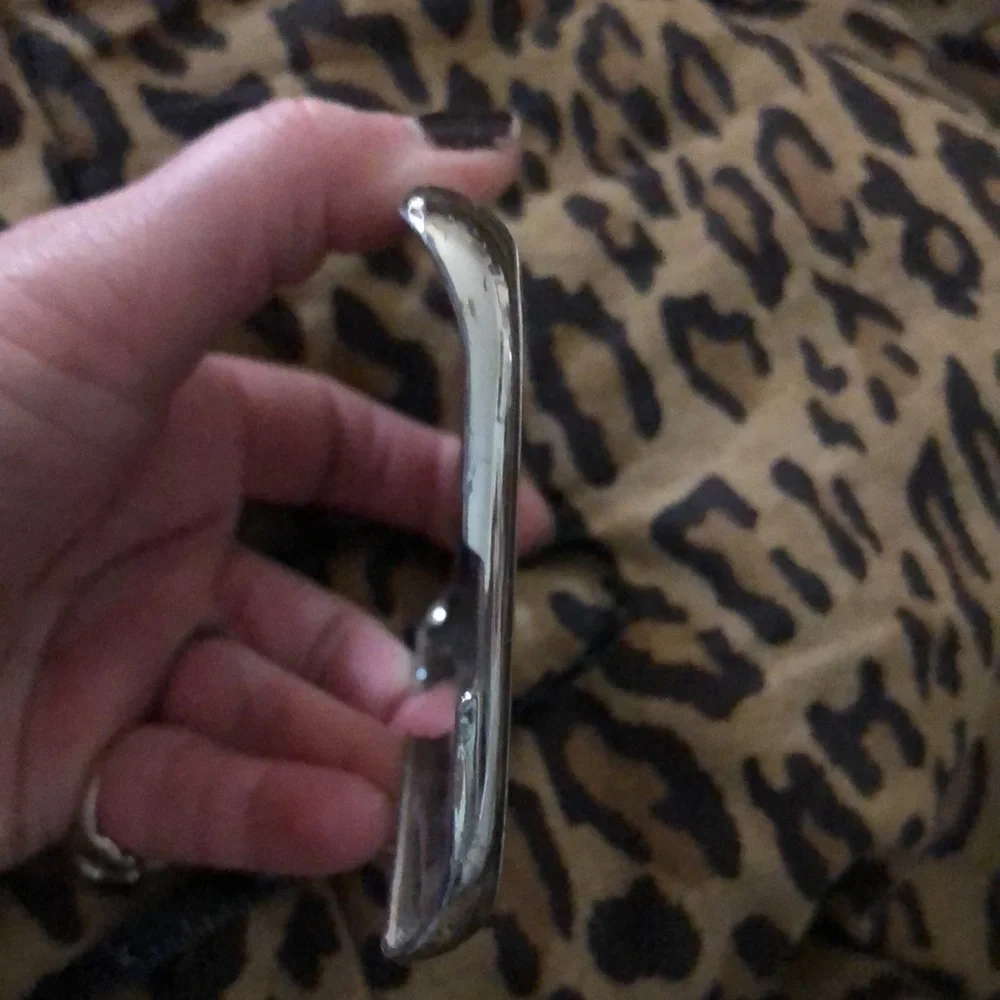 FERRARI silver cell phone case I believe it’s fit a iPhone 5s- 6- 7 ,8